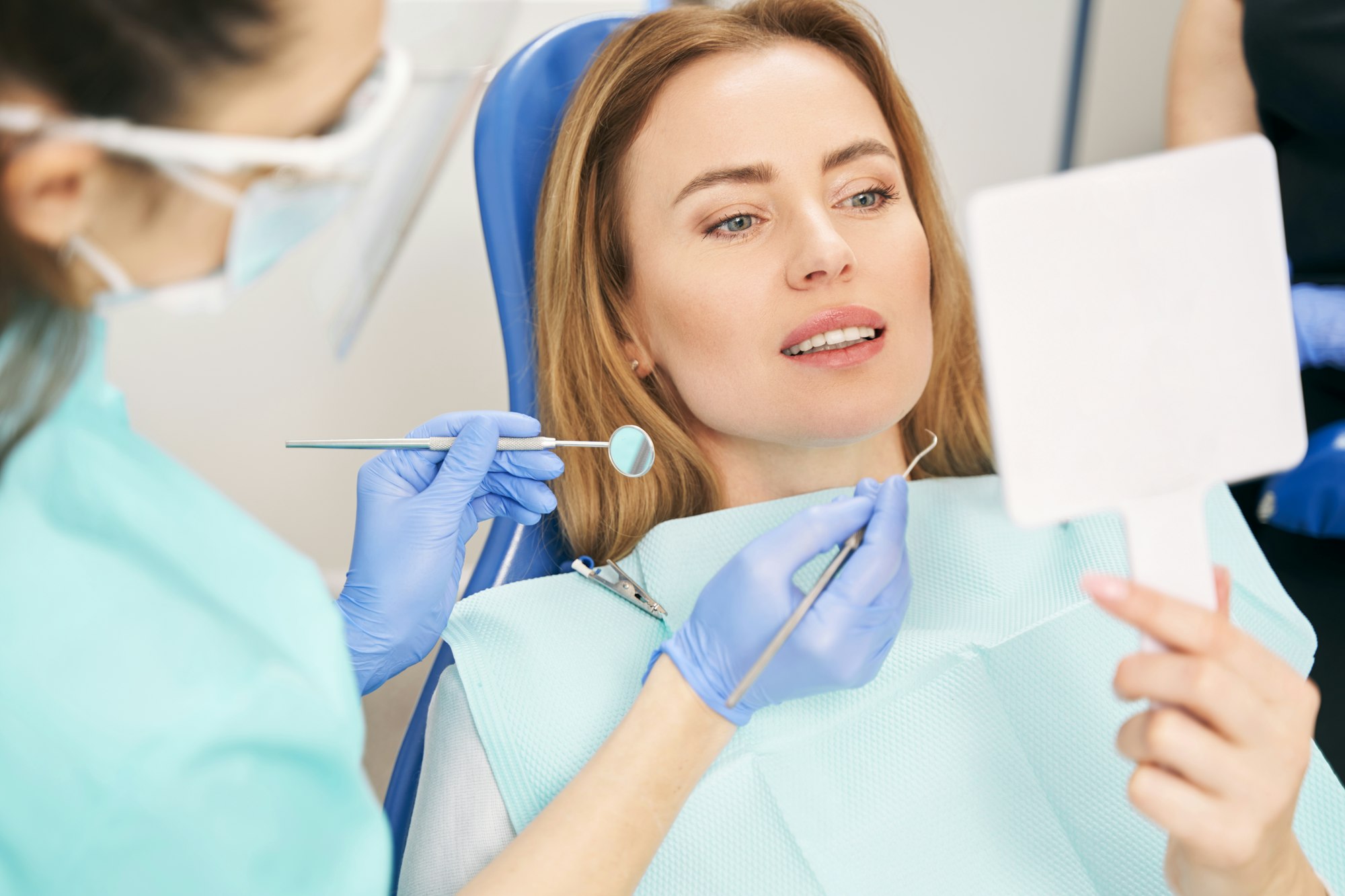 Woman having dental examination in stomatology clinic